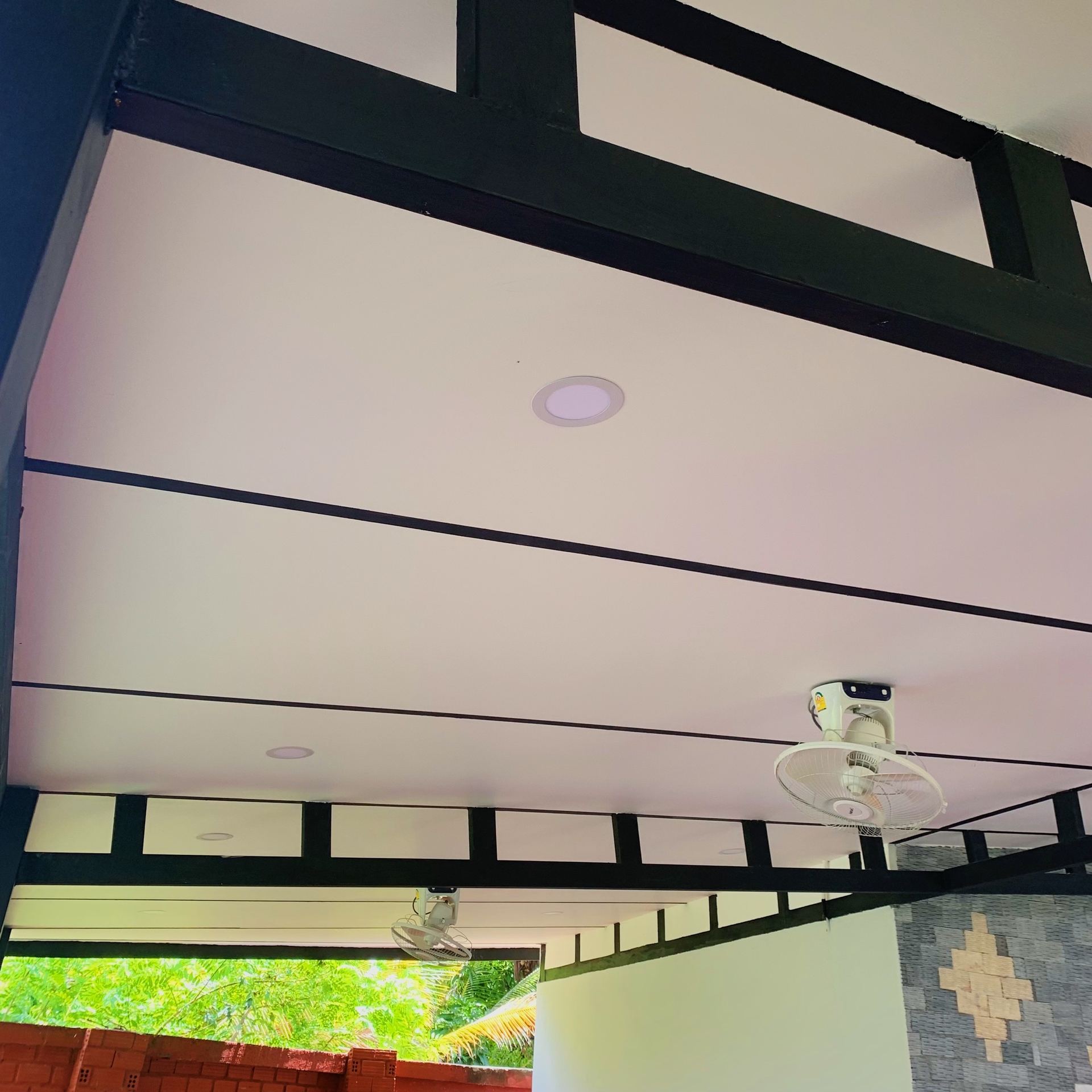 Ben's Deck — hardwood deck threaded around mature root structure, joinery-grade build.