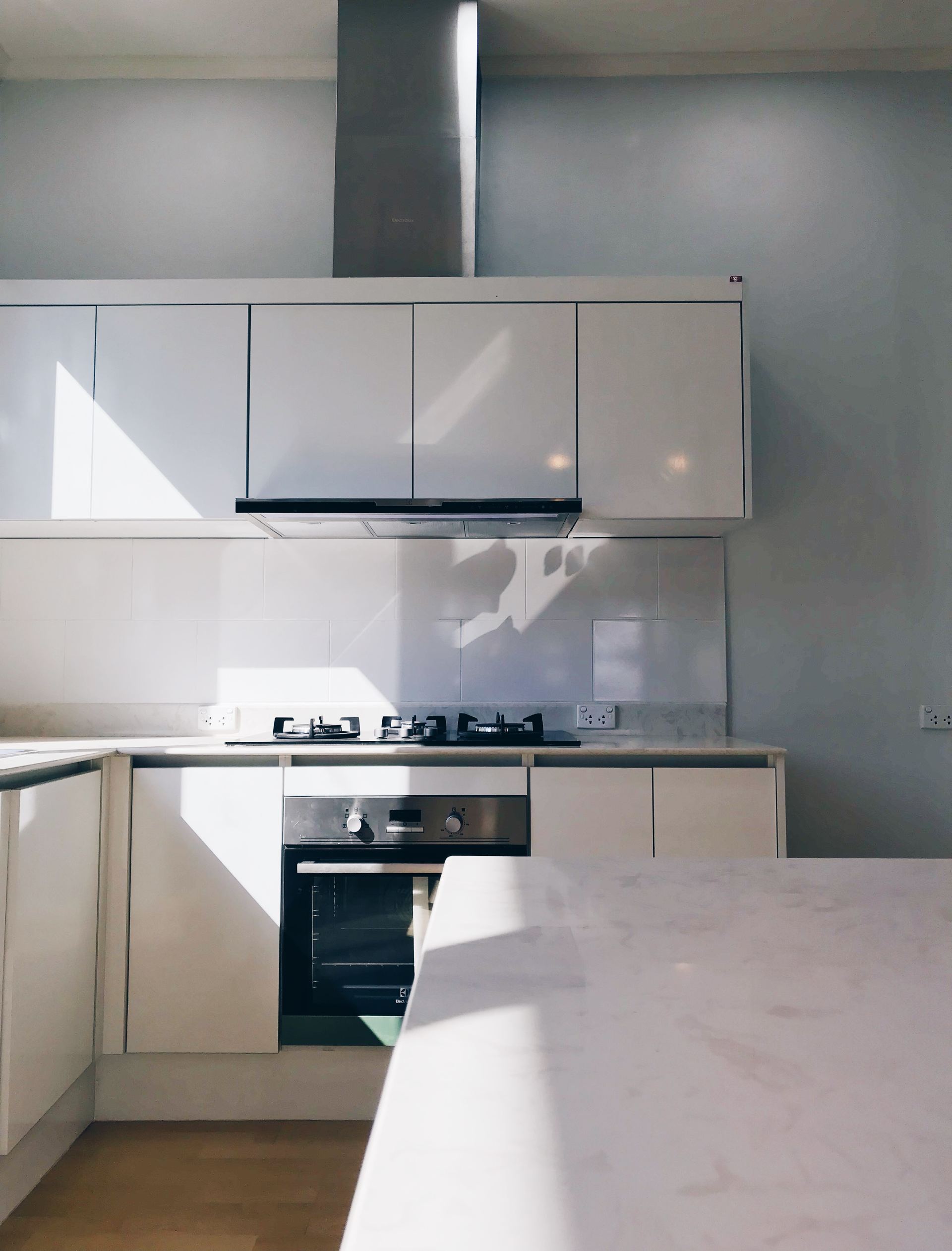 MLH Kitchens — early-portfolio residential kitchen, cabinetry and finished joinery, Vientiane.