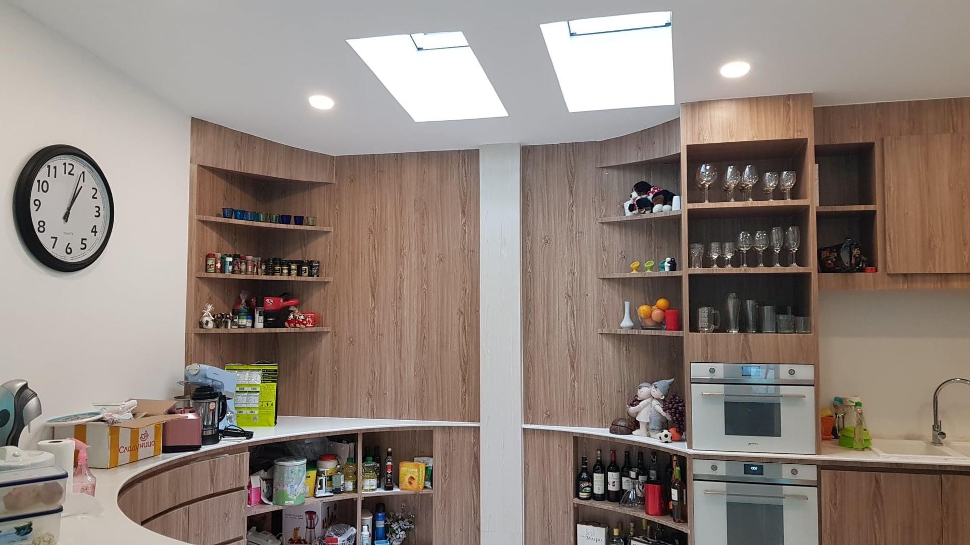 Skylight Installation — roof cut, flashing, weather seal, daylight delivered to a previously dark interior.